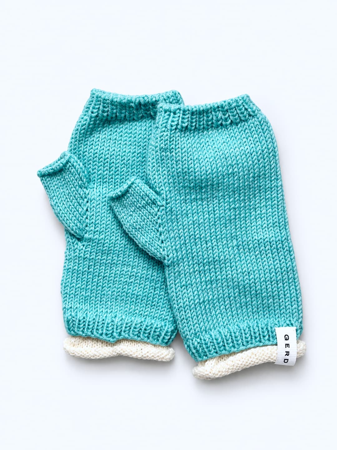Knitted fingerless gloves with a white trim — Tiffany